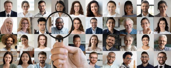 Male,Employer,Holding,Magnifier,In,Hand,Finding,Unique,Talent,African